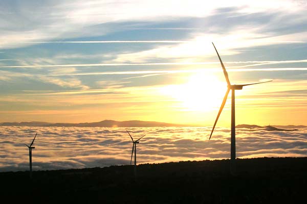 Sunrise in a wind farm.